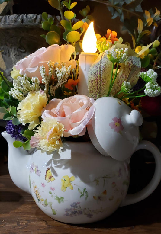 Ceramic Tea Pot Flower arrangement with candle